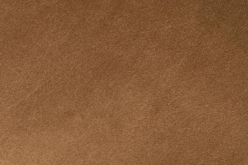 Hocker Aditi Braun mit Samtbezug im Boho-Chic für das Wohnzimmer
