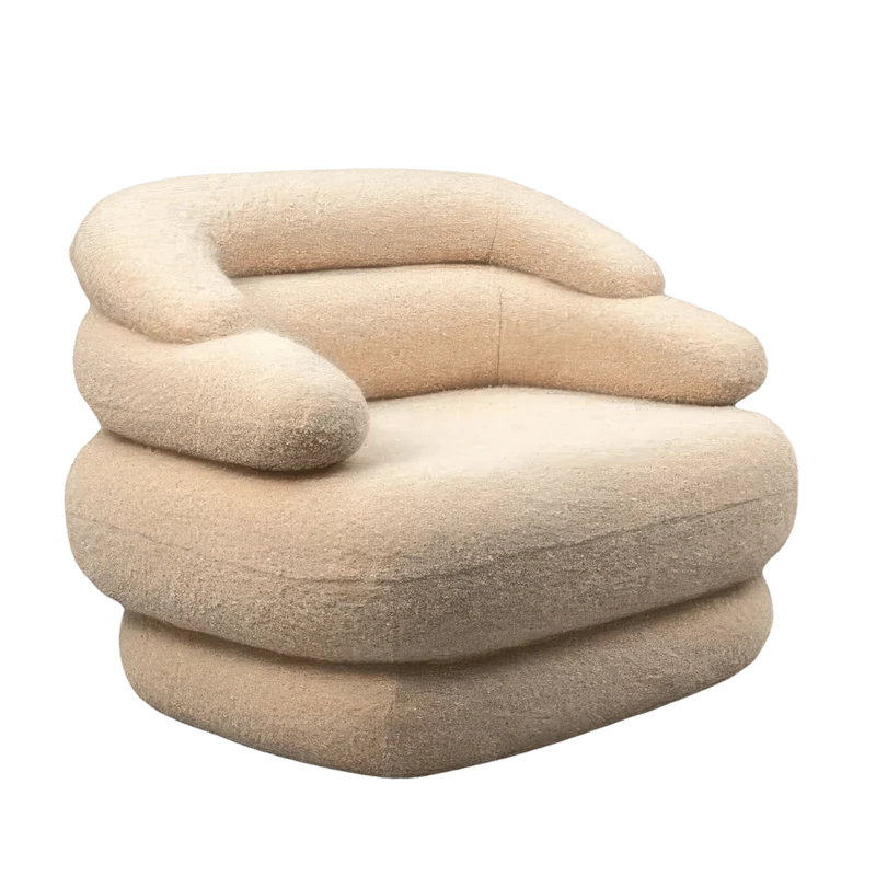 Soar Sculptural Swivel Sofa in Faux Shearling