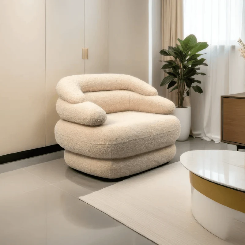 Soar Sculptural Swivel Sofa in Faux Shearling
